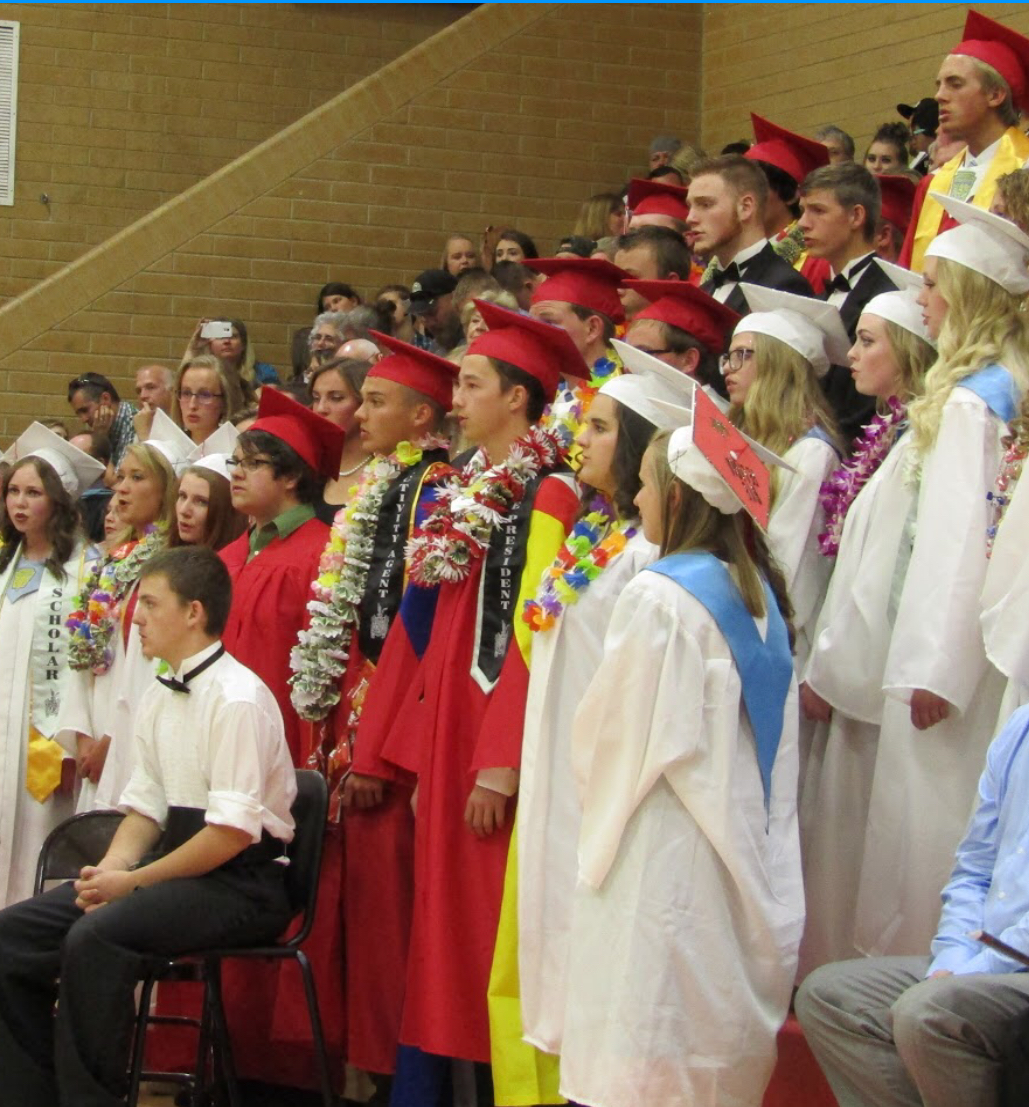 Tradition changed to one color graduation gowns for seniors