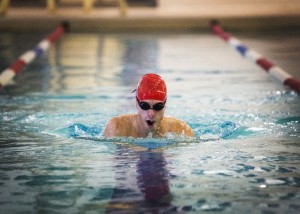 Ben Fryer swimming during one of their competitions.