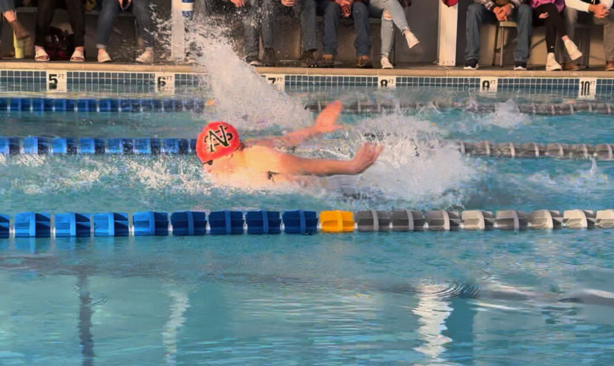 Junior swimmer breaks 500-free record, plans to break more records